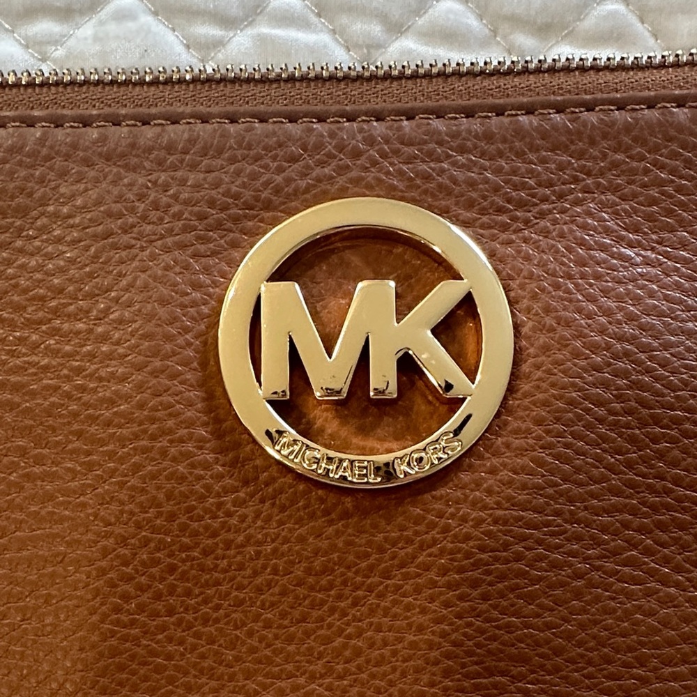 Michael Kors Tan Wristlet with Gold Logo